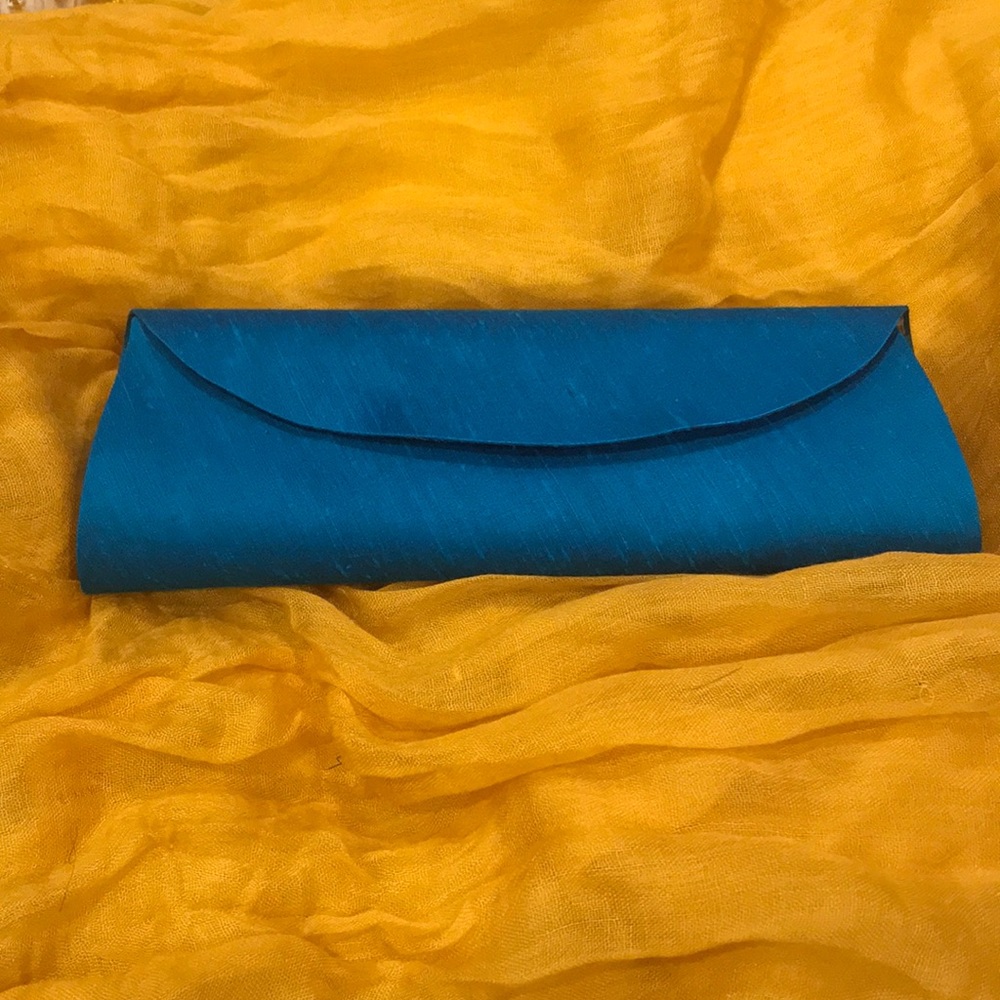 Turquoise raw silk evening clutch.